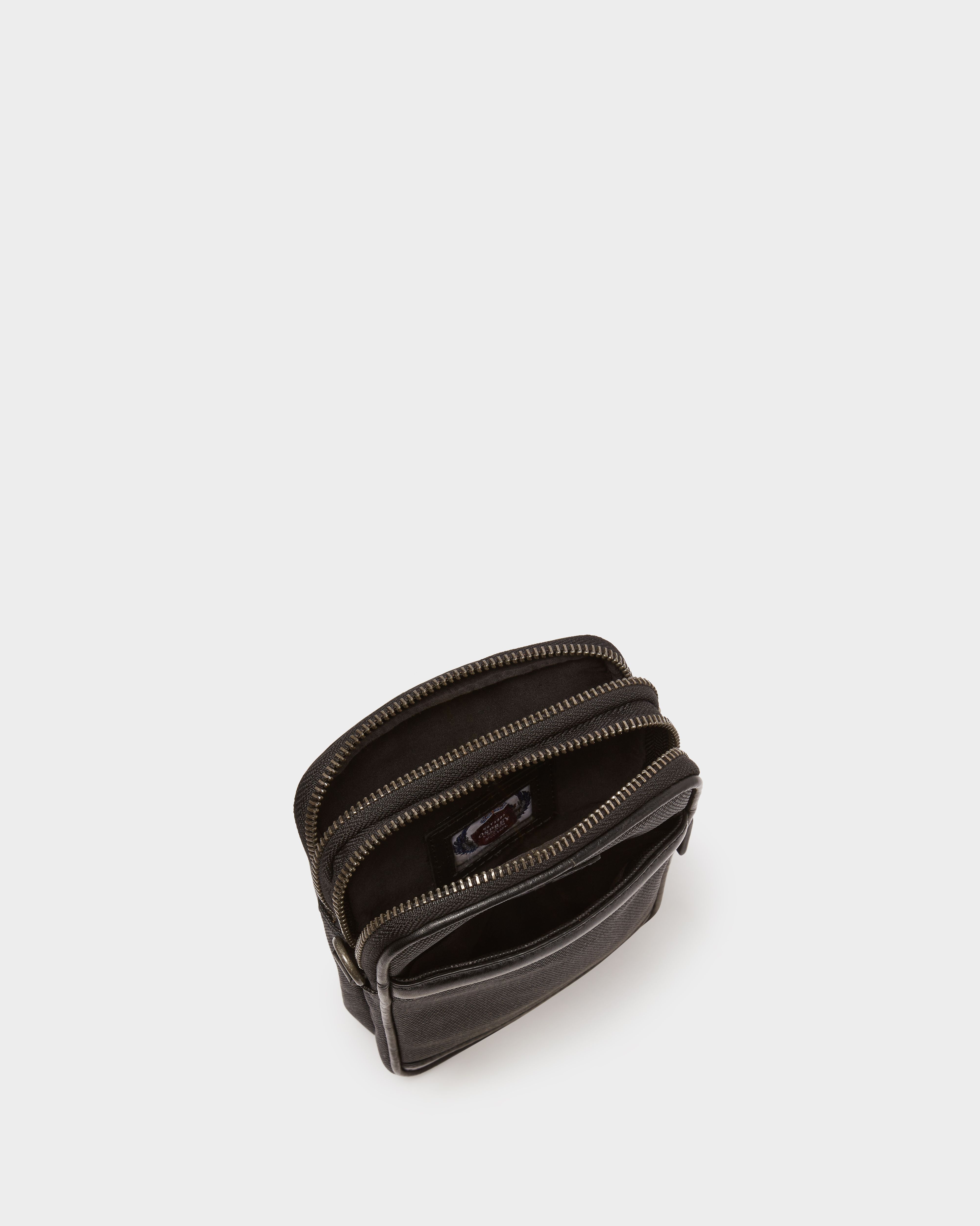 Image number 3 of The Grantham Waxed Canvas & Leather Phone Bag in Black
