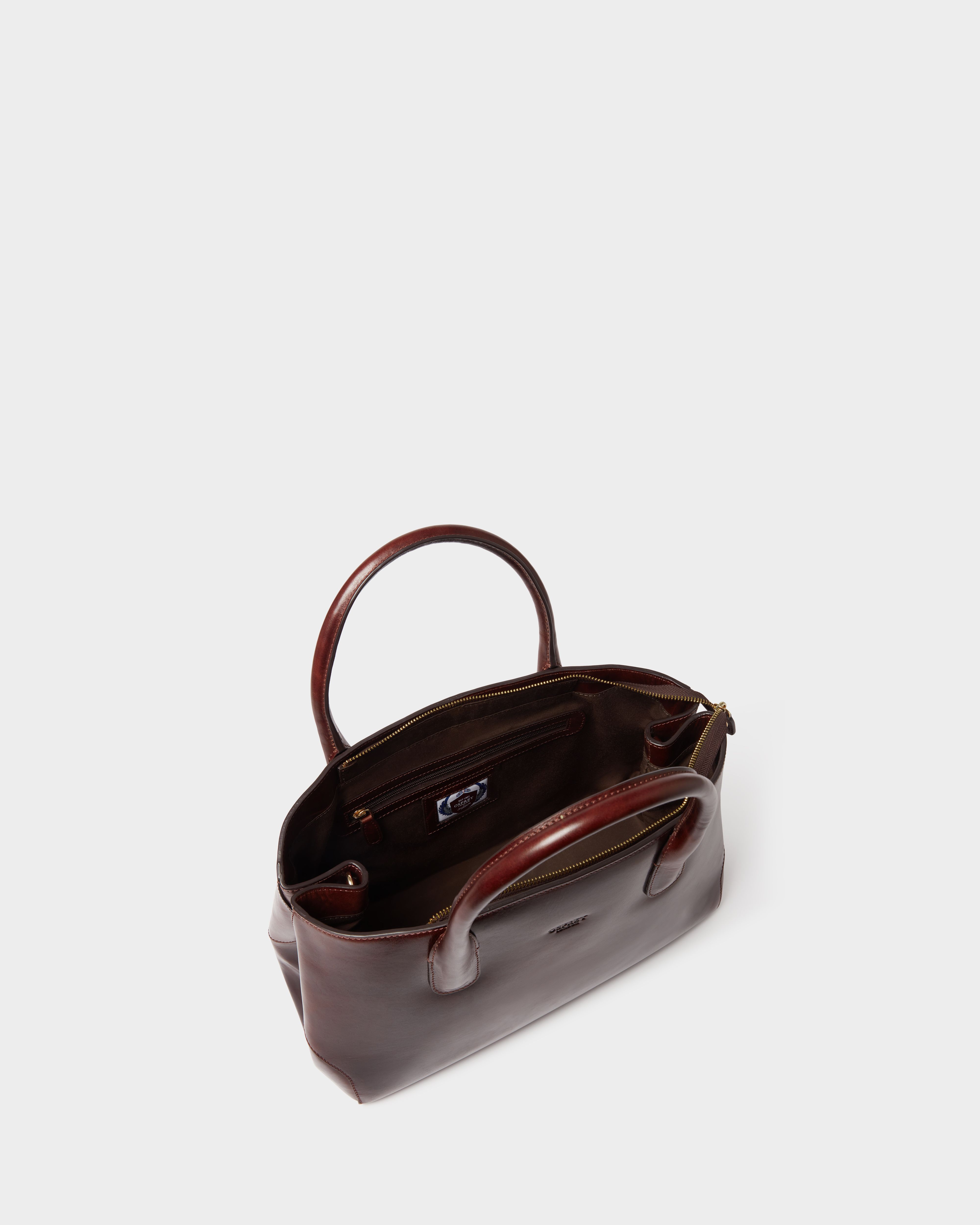 Image number 4 of The Monroe Leather Curved Tote in Chestnut