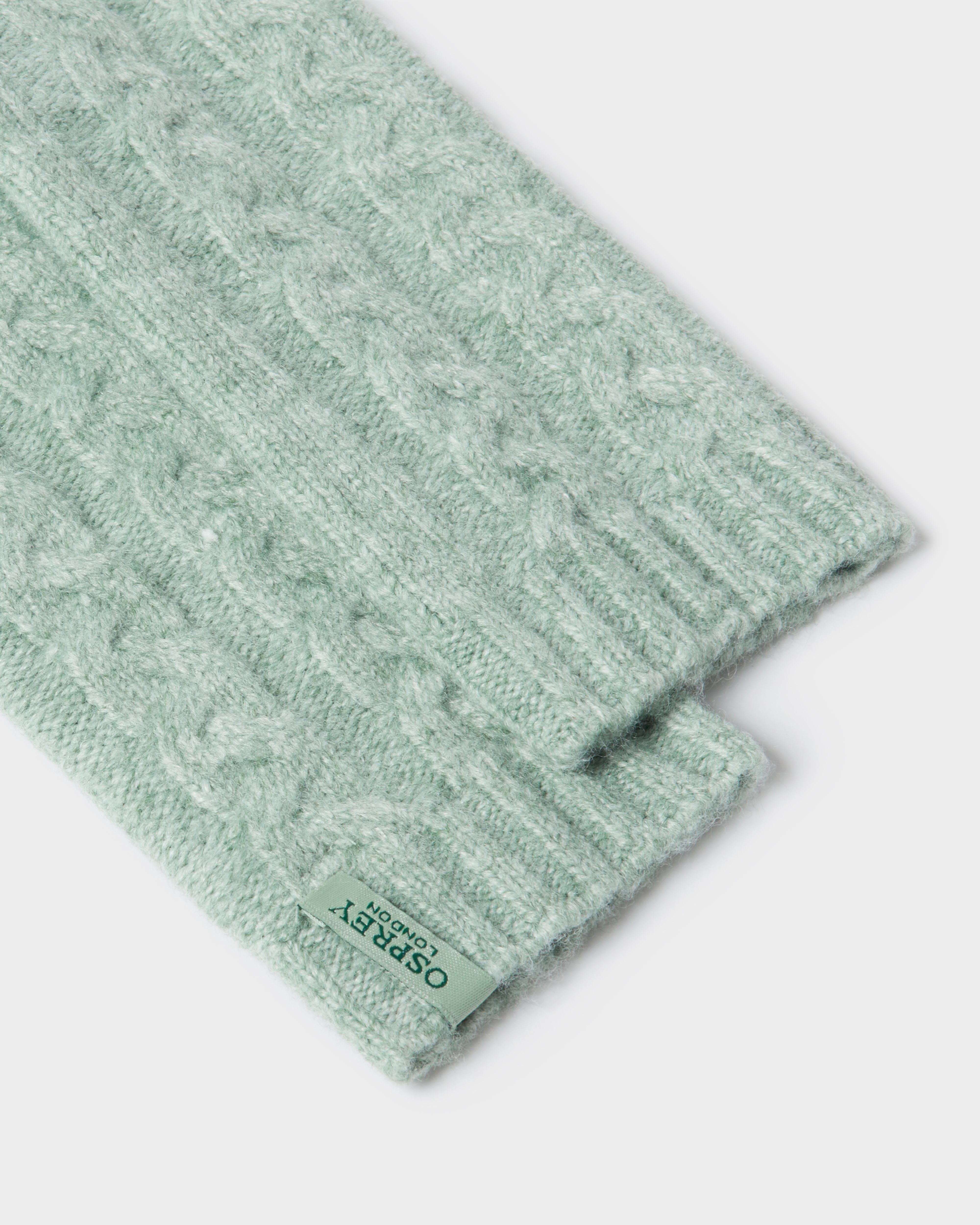 The Heathfield Wrist Warmers in Forest