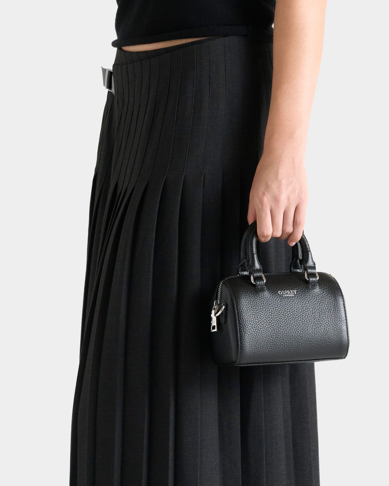 The Madison Mini Leather Barrel Bag in Black