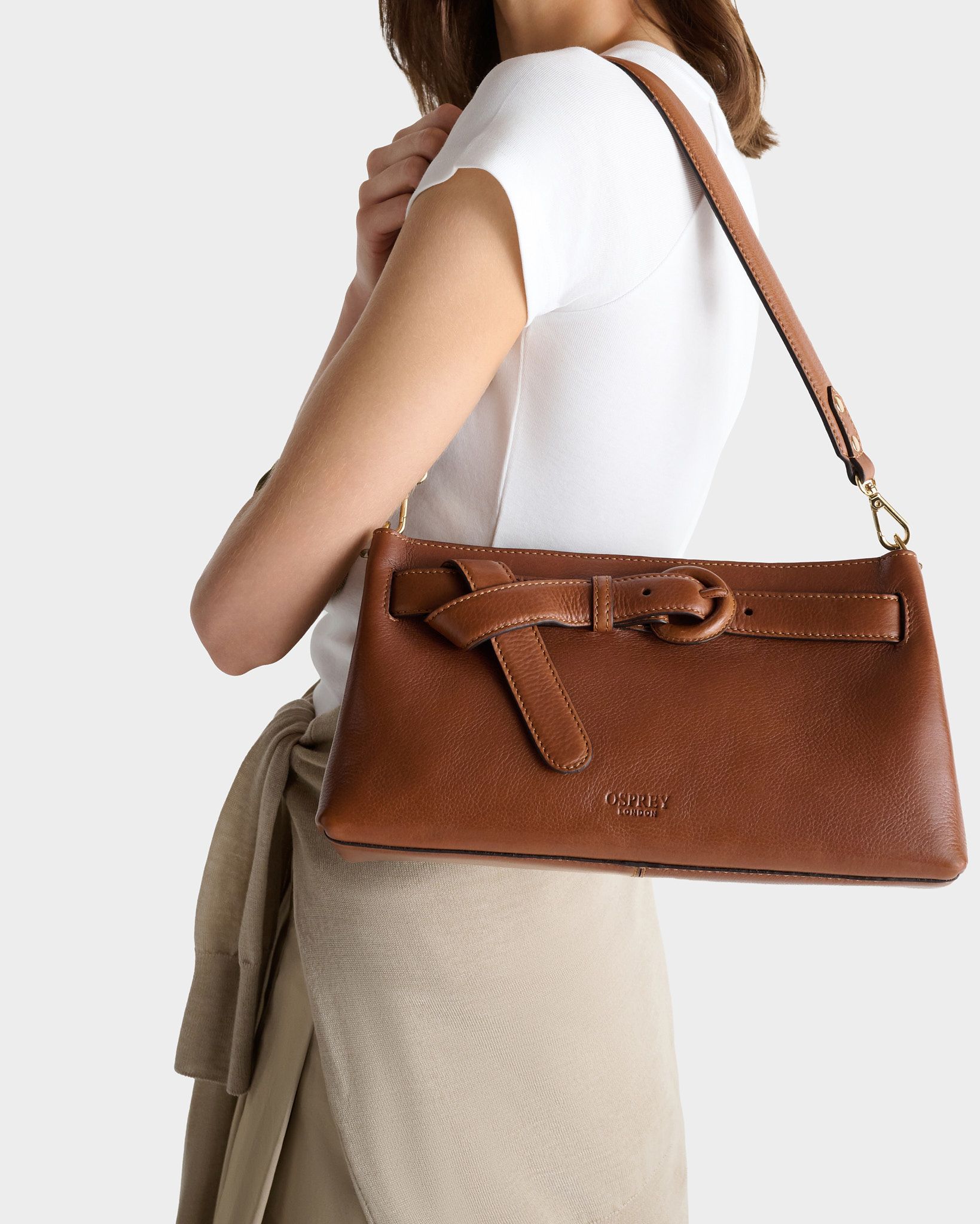 Image number 1 of The East West Belt Leather Shoulder Bag in Tan
