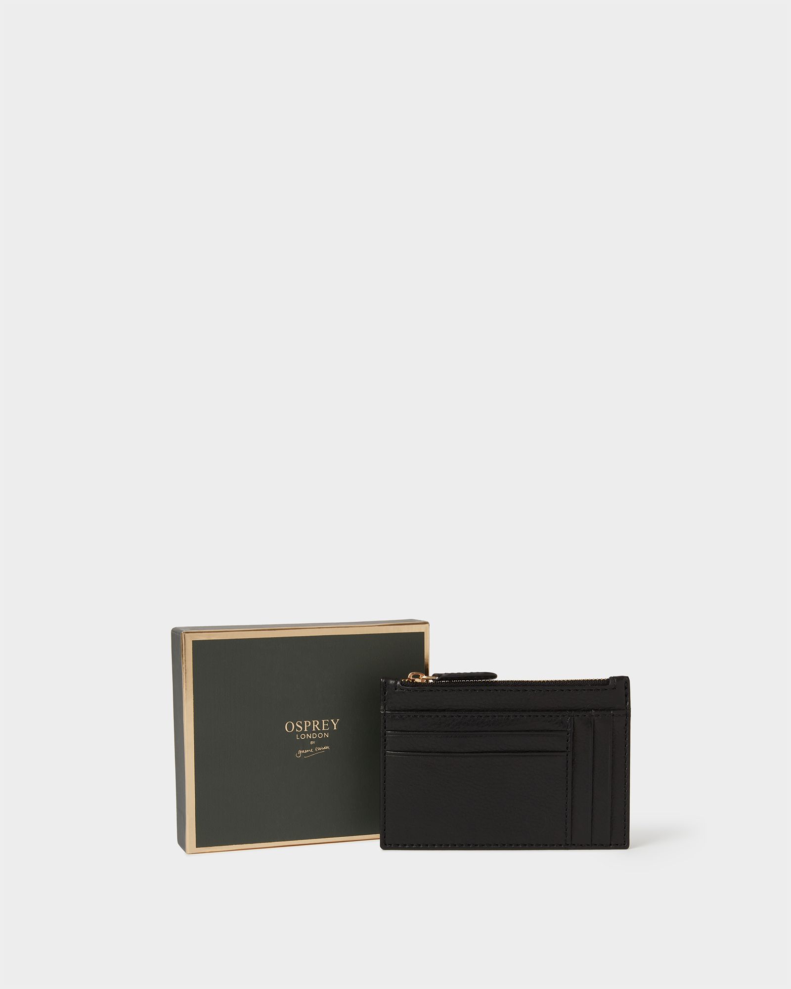 Image number 1 of The O Deboss East West Leather Zip Top Card Holder in Black