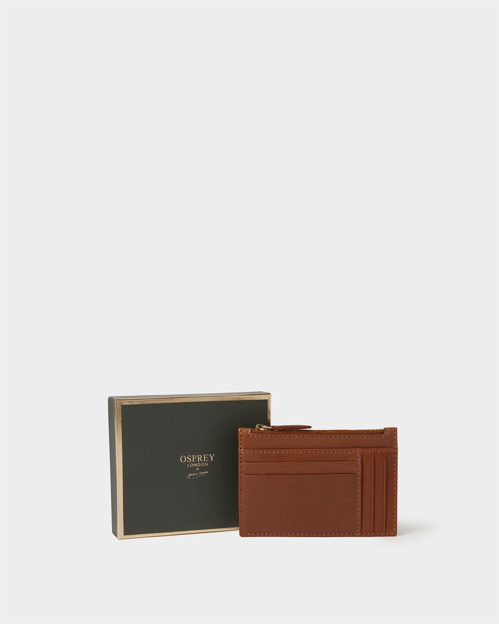 Image number 1 of The O Deboss East West Leather Zip Top Card Holder in Tan