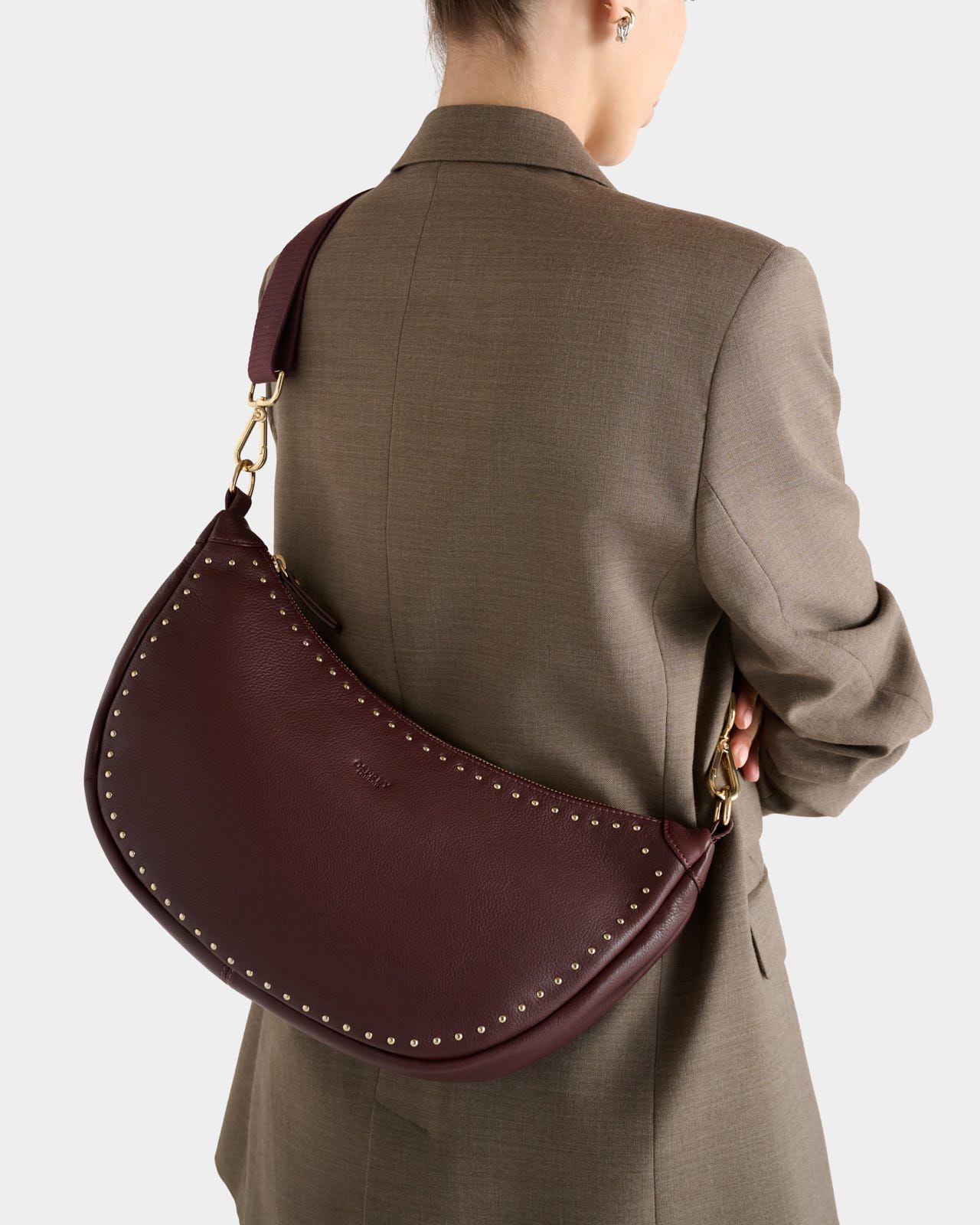Image number 1 of The Studded Leather Sling in Merlot