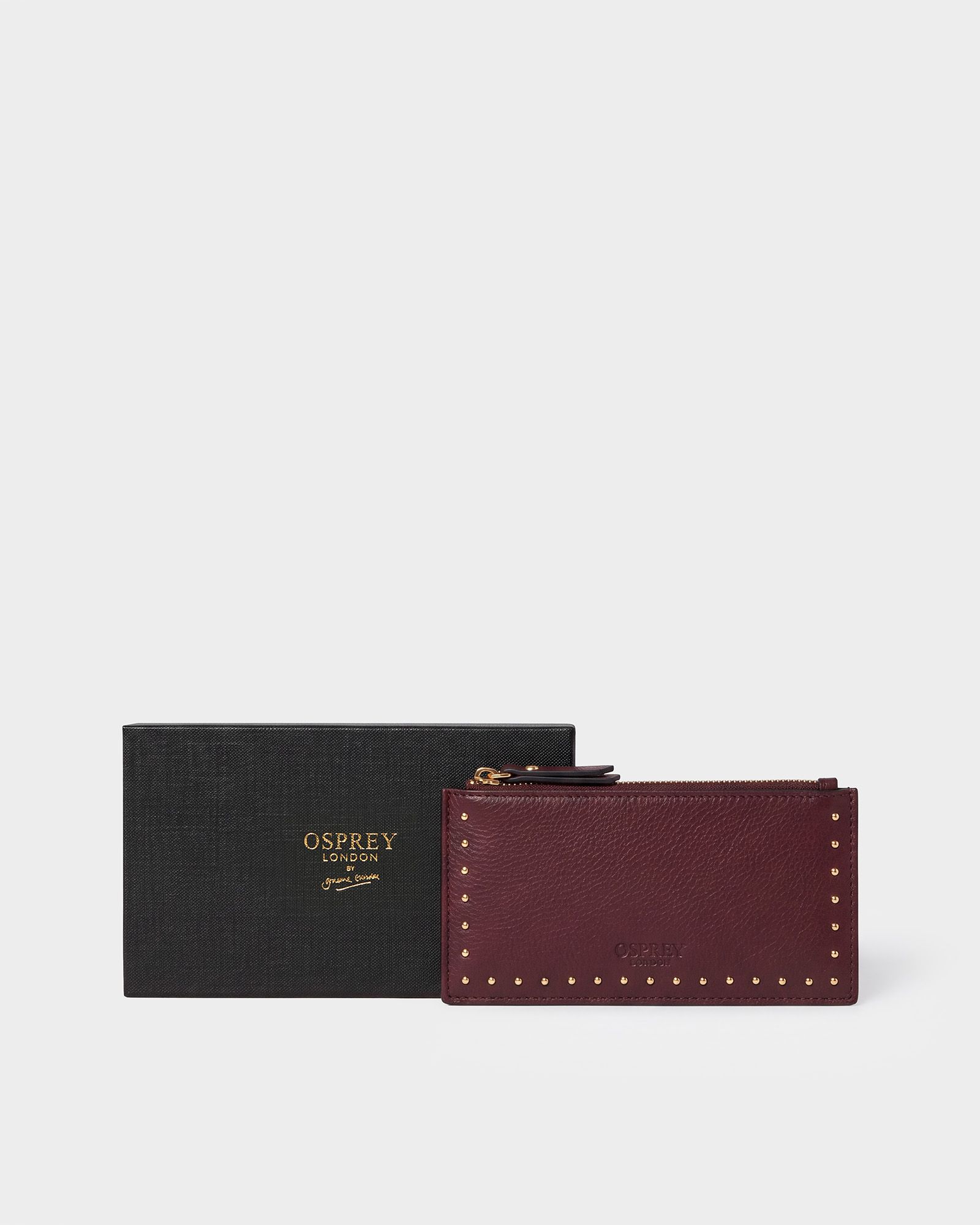 Image number 1 of The Studded Leather Zip Card Holder in Merlot
