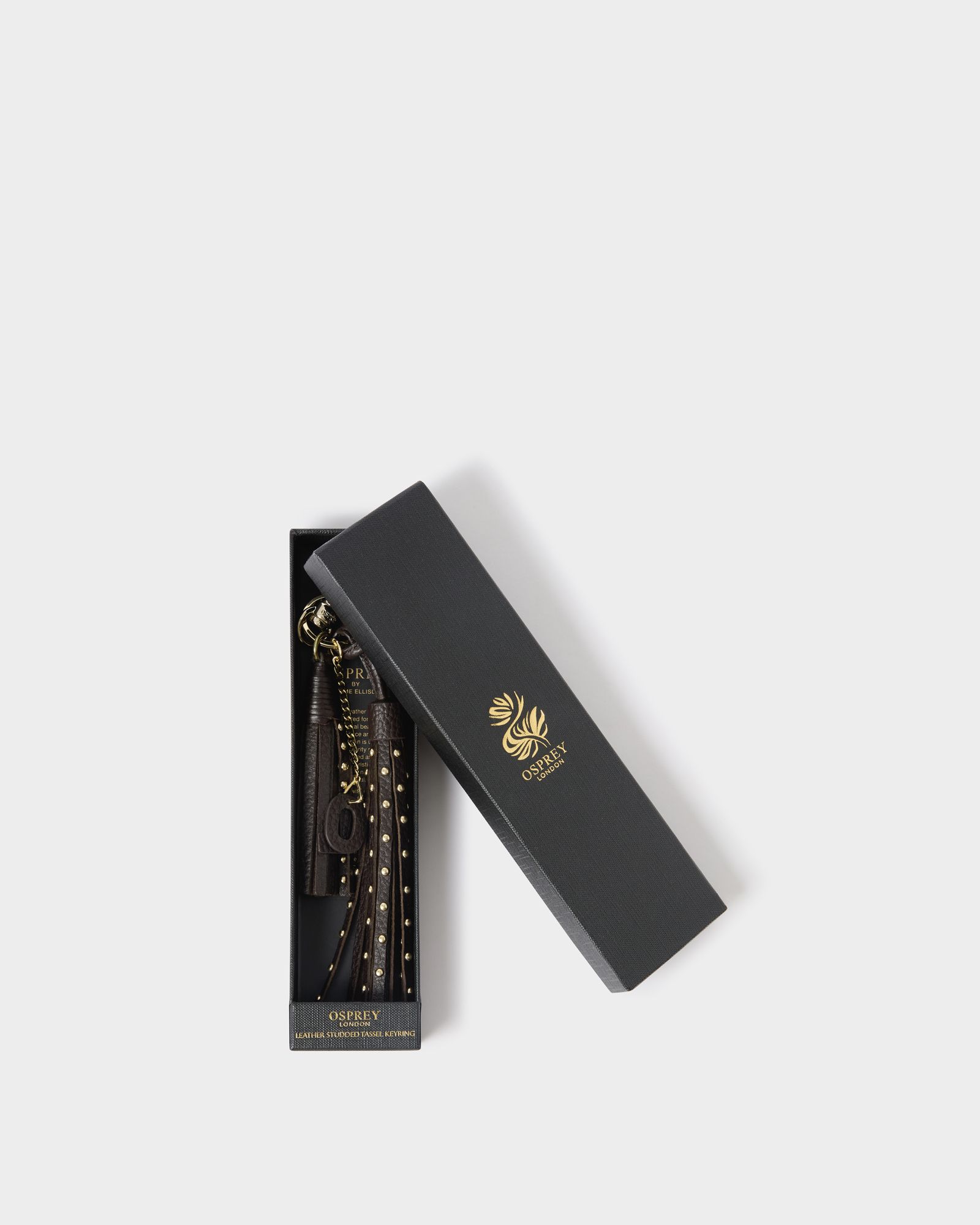 Image number 1 of The Studded Leather Tassel Keyring in  Chocolate