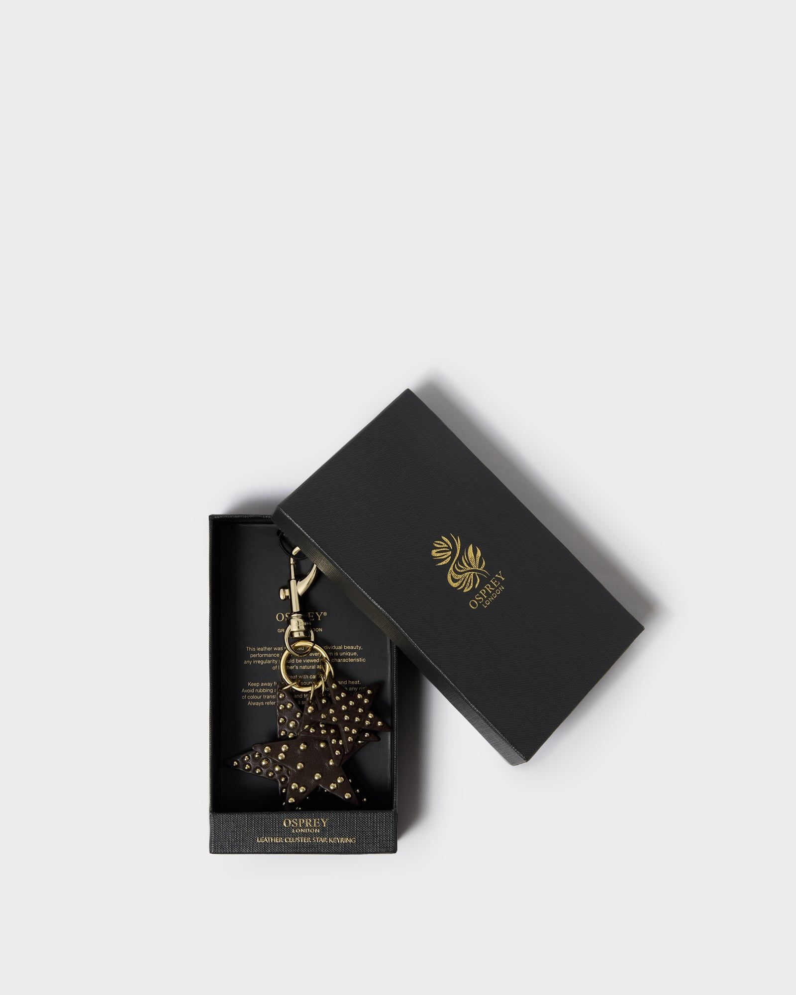 Image number 1 of The Cluster Star Leather Keyring in Chocolate