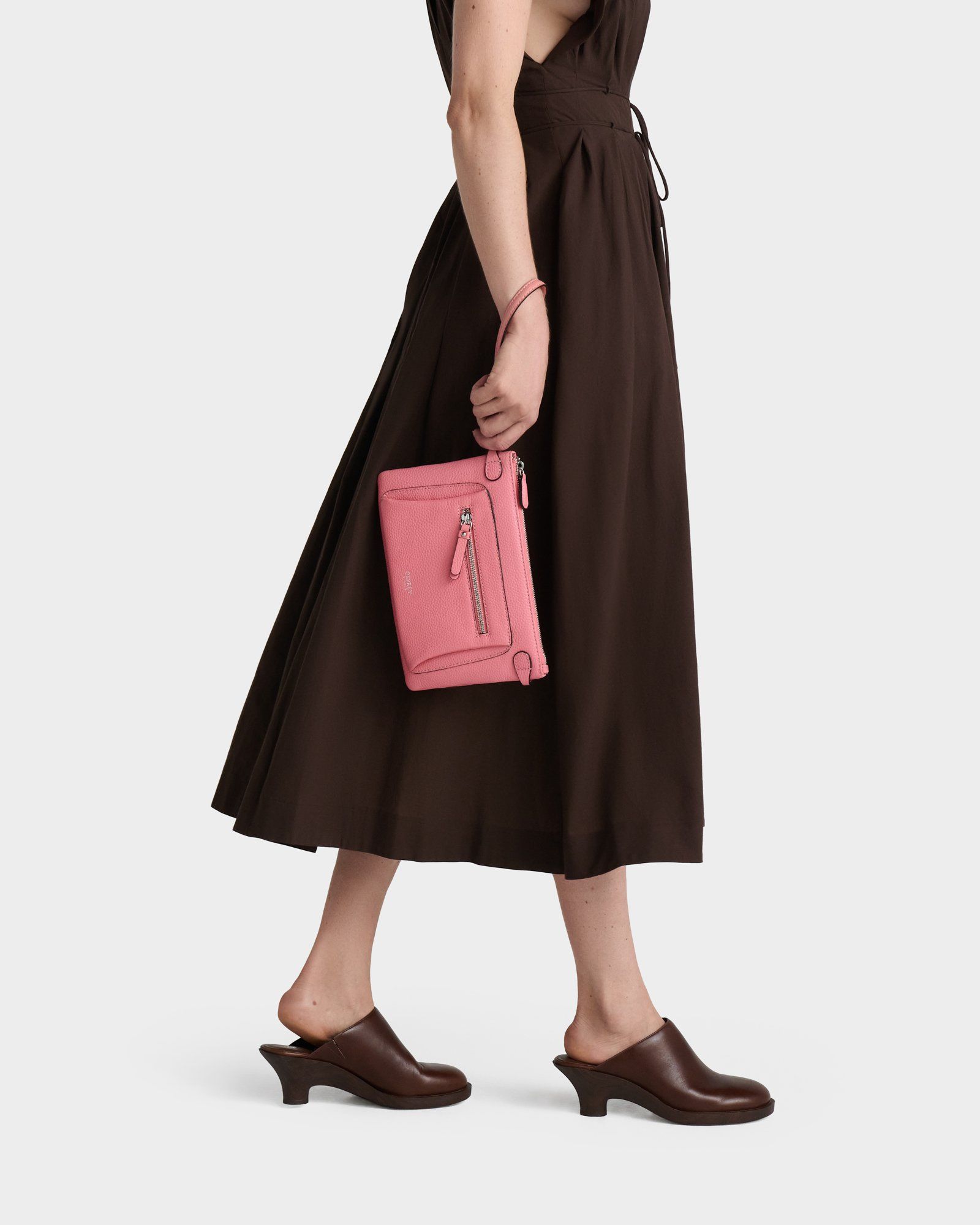 The Ruby Leather Crossbody Clutch in Peach