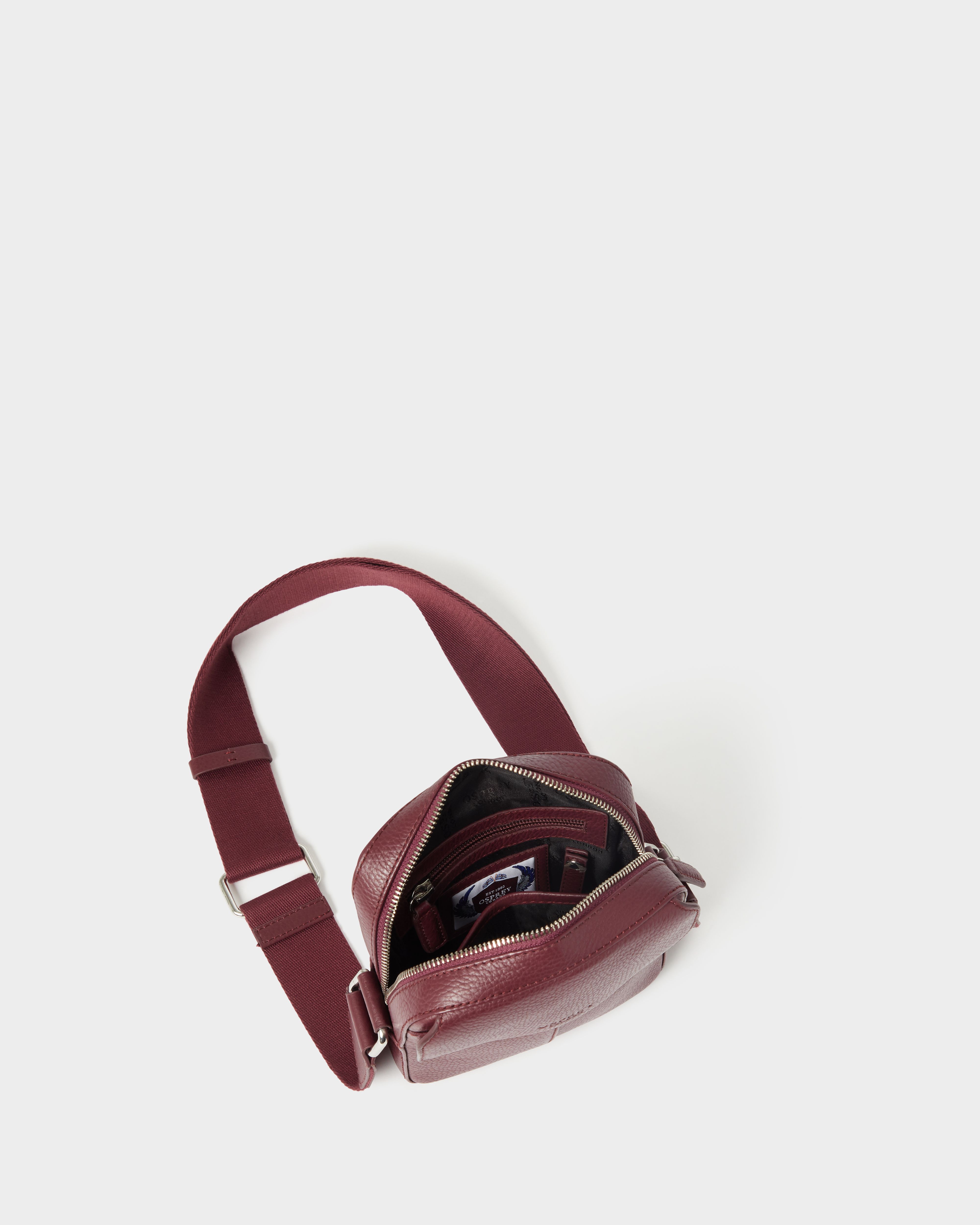 Image number 5 of The Jacob Leather Phone Bag in Merlot